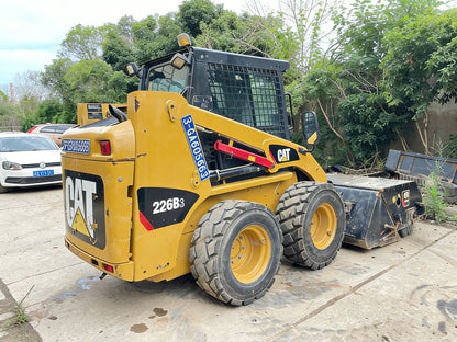 Подержанный скользящий погрузчик Caterpillar 226B